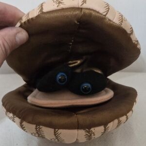 Plush Clam Toy with Blue Eyes